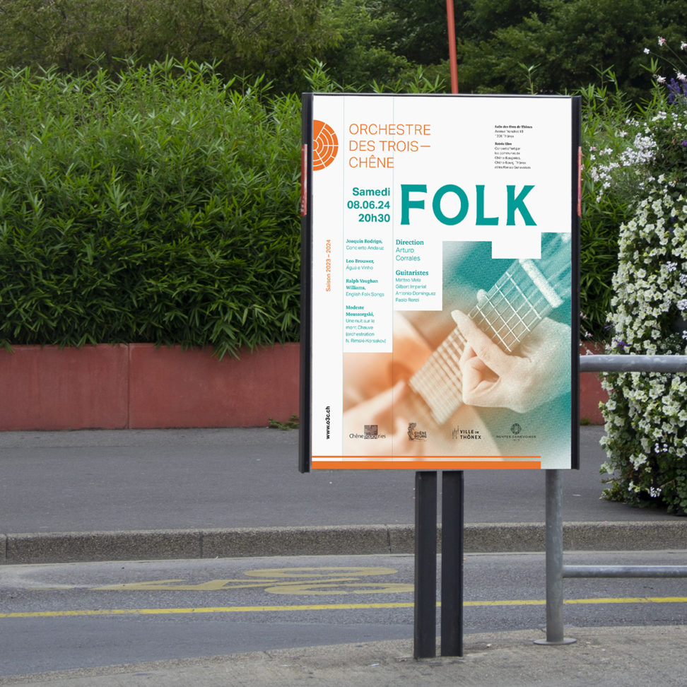Photo de l’affiche “Folk” en situation sur un panneau dans la rue.